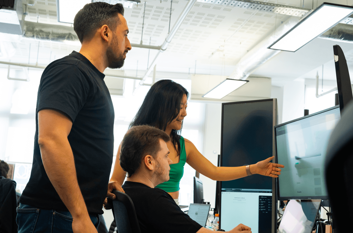 Product and marketing team at a whiteboard